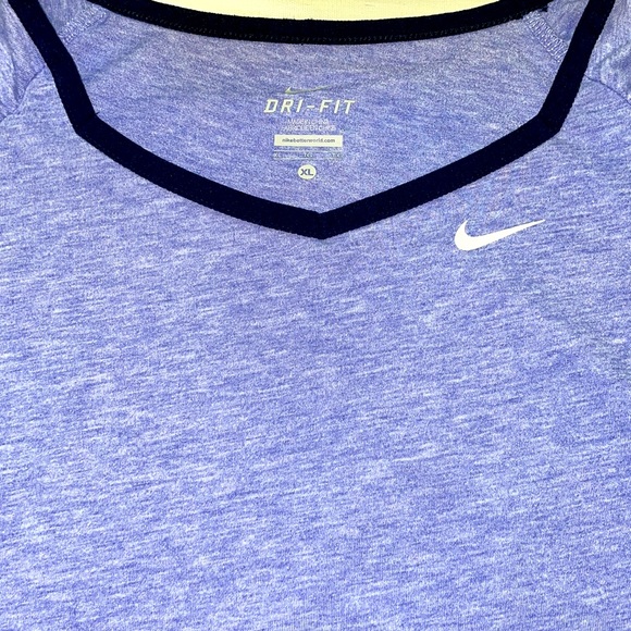Nike short sleeved dri-fit women’s XL fits like a large. - Picture 2 of 9
